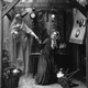 A set-up picture from the 1860s of a woman getting a scare from a transparent apparition appearing in her kitchen on the stroke of twelve. (Photo by Hulton Archive/Getty Images)